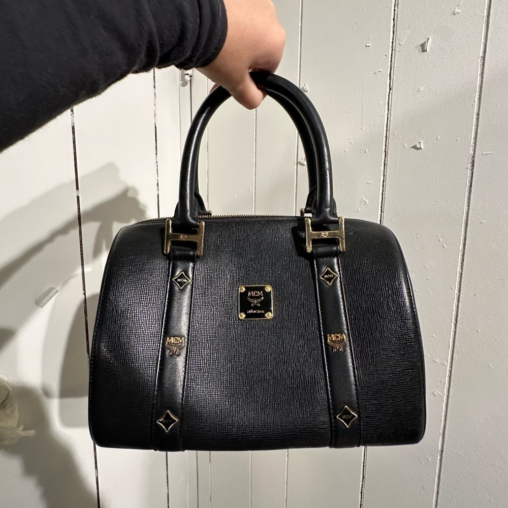 MCM Black Leather Boston Handbag with Gold Hardware